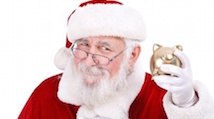 Santa Claus holding piggy bank