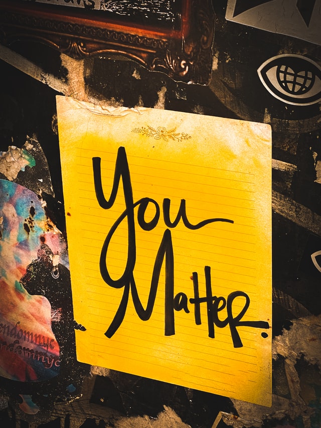 yellow sign that says you matter