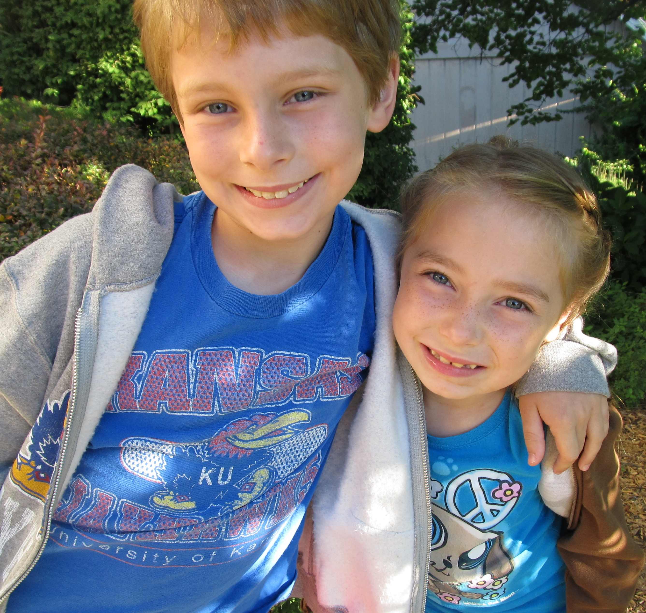 children wearing blue t-shirts